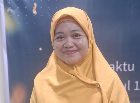 Dr. Maria Ulviani, M.Pd